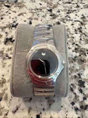 Movado Stainless Steel Watch with Black Dial and Silver Bracelet